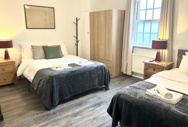 In each room: Microwave, plates, bowls, cutlery, tea, coffee, sugar, biscuits, kettle, mugs, drinking glasses