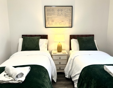 In each room: Microwave, plates, bowls, cutlery, tea, coffee, sugar, biscuits, kettle, mugs, drinking glasses