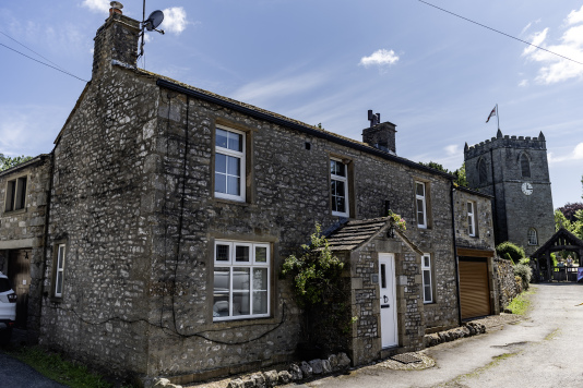 Our stunning double-fronted cottage, Bridge House Hot Tub Retreat, Kettlewell, blends timeless character with modern comfort.

Beautifully presented with classic stone frontage and thoughtful interiors, this charming escape offers the perfect balance of countryside charm and indulgent relaxation - complete with your own private hot tub for those peaceful, restorative evenings.