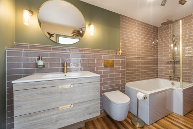 Ensuite bathroom with bathtub