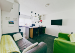 Living room: Comfy seating and Smart TV