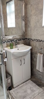 Shower room with hand basin and WC