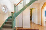 Lobby leading to bedrooms and upstairs