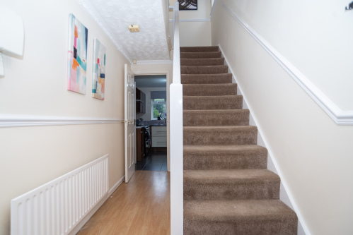 An open and welcoming hallway, creating a warm first impression on arrival.