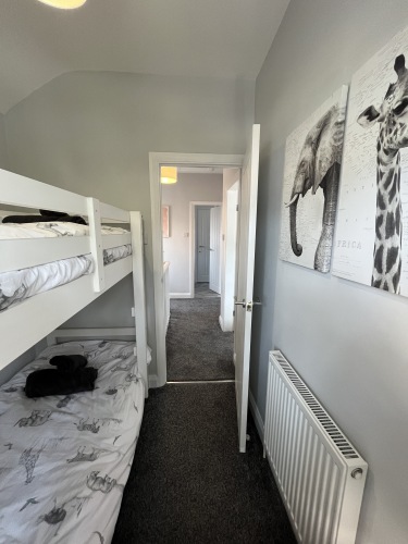 Bedroom three - cosy room with single bunk beds