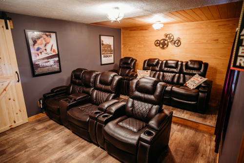 Lower level movie room with 100+ movies to choose from