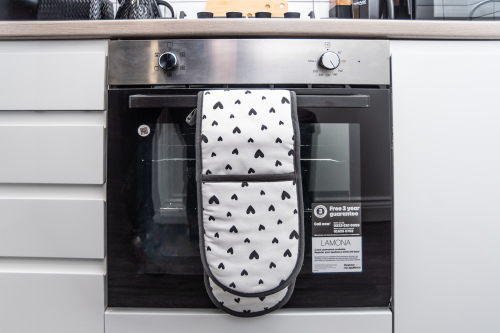 Modern oven with essentials provided for easy self-catering.