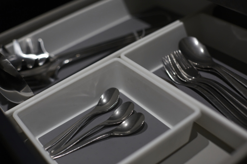 Well-appointed kitchen with essential appliances and ample workspace.