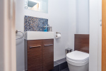 Downstairs WC with a clean, modern finish for quick convenience during your stay.
