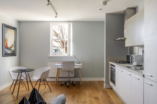 This sleek, contemporary kitchen combines high-end finishes with flawless functionality. Featuring premium appliances, elegant cabinetry, and a stunning island centerpiece, it’s the perfect space for cooking, entertaining, and enjoying everyday luxury.