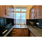 This photo represent the kitchen of the property. 