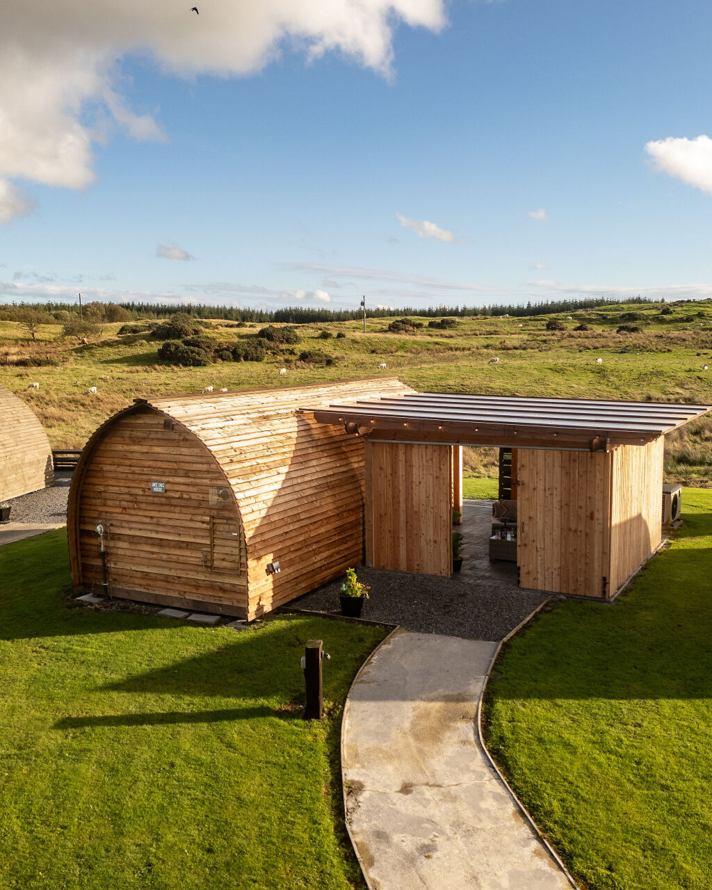 [{'Text': 'View of pod from behind', 'CultureCode': 'en-GB'}] glamping cabins and grounds, photo 14 of 32