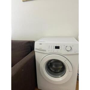 This photo represents the washing machine inside the flat. 