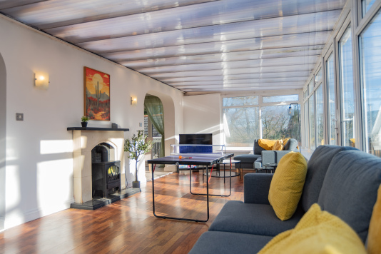 A versatile games room and second lounge off the kitchen, creating a spacious hub for family time and group get-togethers