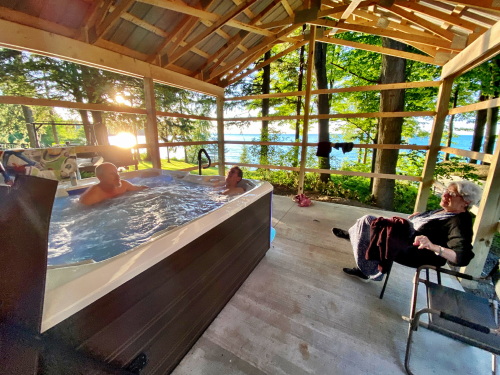 Hot tub/spa house is enclosed by winter for easy year around use. 