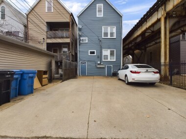 Convenient off-street parking welcomes you to this charming property, located just steps from public transit. Enjoy ease of access in a private driveway in this vibrant urban setting.