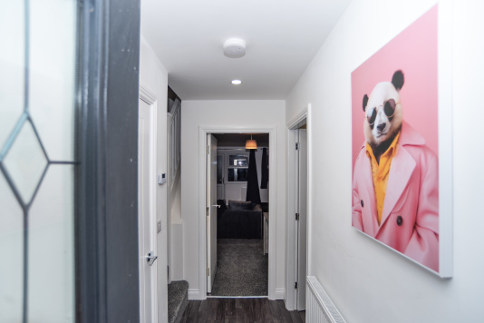 Light, open entryway that sets the tone for a clean and comfortable stay.