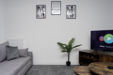 Comfortable living area featuring Smart TV and high-speed Wi-Fi