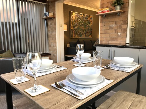 Dining space to enjoy a delicious local take away or home cooked meal - TLC Stay Preston area home