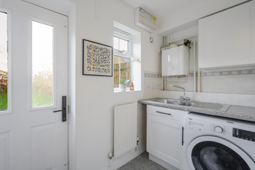 A thoughtfully designed space that keeps daily living effortless and organised. Equipped for laundry and storage, the utility room ensures essentials are neatly tucked away, preserving the home’s calm, uncluttered feel. Functional, refined and perfectly hidden — luxury in the details.