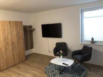 Guest Room - Sitzgelegenheit mit SAT - TV