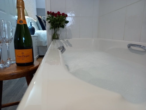 Relax in a bath full of bubbles after a busy day exploring Ironbridge