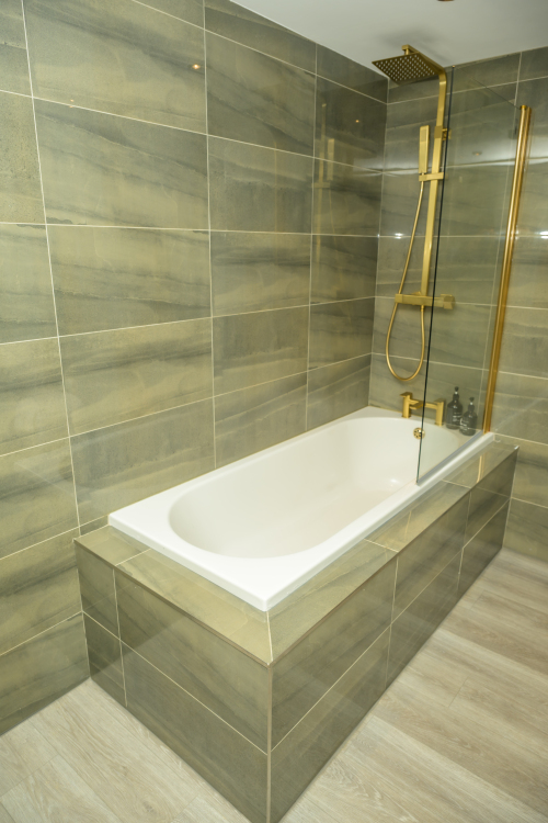 Relax and refresh in this clean and stylish bathroom space.
