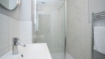 Modern ensuite. Walk-in shower in a brand new clean modern bathroom, toiletries and towels provided.