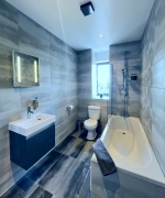Full bathroom with rainfall shower and egyprian cotton towels.
