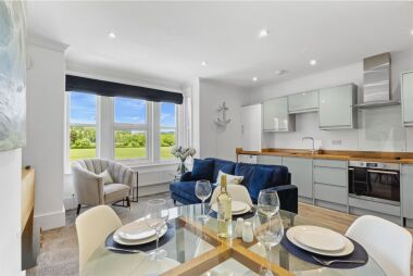 Open plan stylish kitchen and lounge