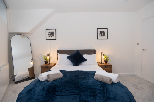 A beautifully decorated second double bedroom with brand-new interiors, super-comfy beds and mattresses, hotel-quality linen, and built-in wardrobes - the perfect Birmingham city centre base for colleagues, friends or family stays.