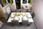 Dining area for 8 guests with brand new dining table chair set and crockery sets