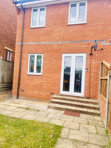 back garden with access to allocated car park