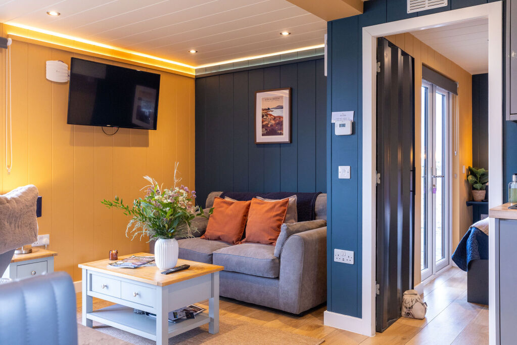 [{'Text': 'Living room', 'CultureCode': 'en-GB'}] glamping cabins and grounds, photo 22 of 32