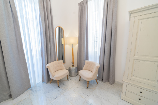 bedroom, seating area