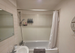 Bath, shower, and complimentary essentials included.