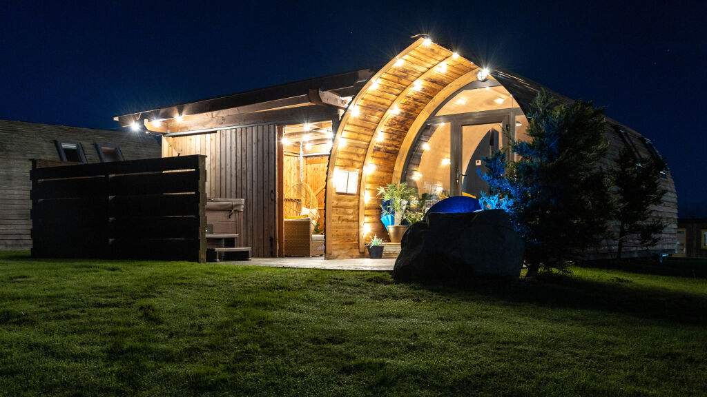 [{'Text': 'Outdoor at night', 'CultureCode': 'en-GB'}] glamping cabins and grounds, photo 16 of 32