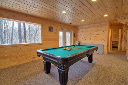 Pool Table, picture window and Exit Door, Lower Level