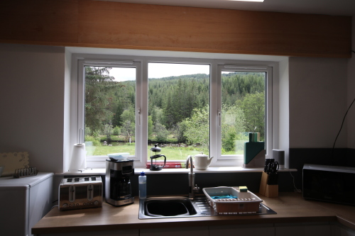 View from Kitchen window to rear garden and river