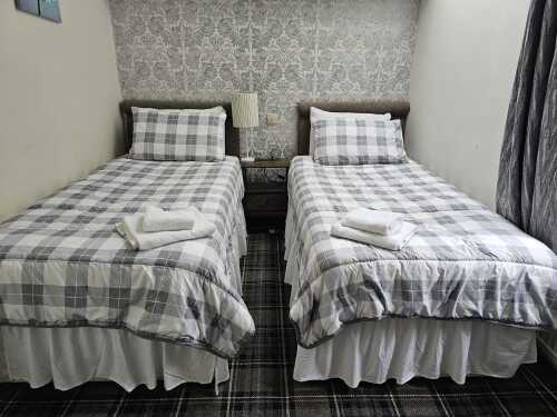 Bedroom number three, charging ports & coverless Duvets