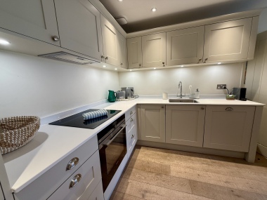fully fitted kitchen with dishwasher