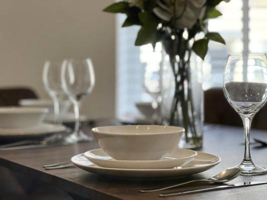 Spacious table ideal for dining, studying, or working.