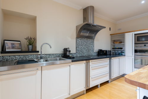 Luxury kitchen with hob, double oven and microwave