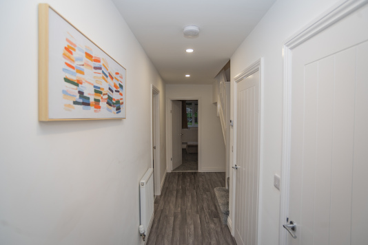 Bright, welcoming hallway that creates a warm first impression as soon as you arrive.