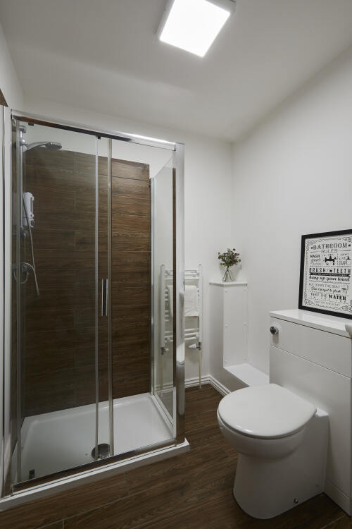 Bright and spotless bathroom in Castleford, designed for comfort and convenience during your stay