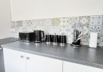 Kitchen: Toaster, Kettle, Tea, Coffee, and Sugar
