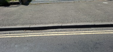 detail showing 3 inch kerb at front of property