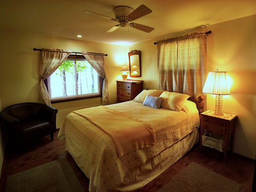 Master Bedroom has a lake view and Queen Bed. 