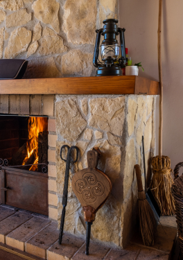 Cozy rustic fireplace for winter afternoons and evenings.