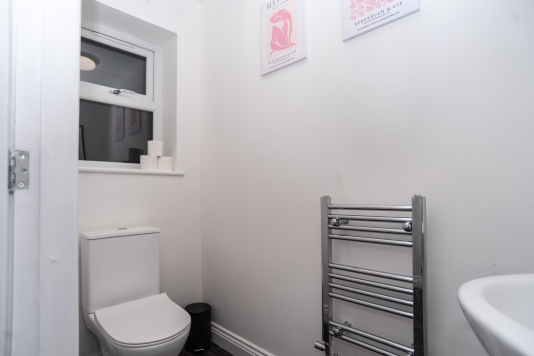 Convenient downstairs WC for easy access during your stay.